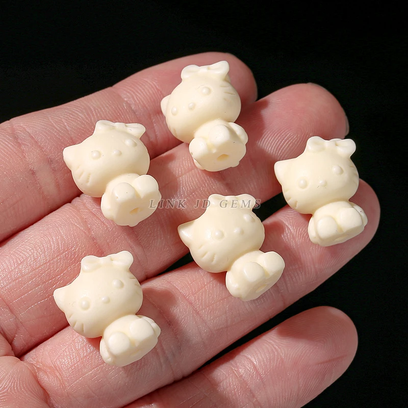 JD Wholesale Handmade Carved Natural Natural Phytelephas Macrocarpa Ivory Nut KT Cat Shape Spacer Beads for Jewelry Making
