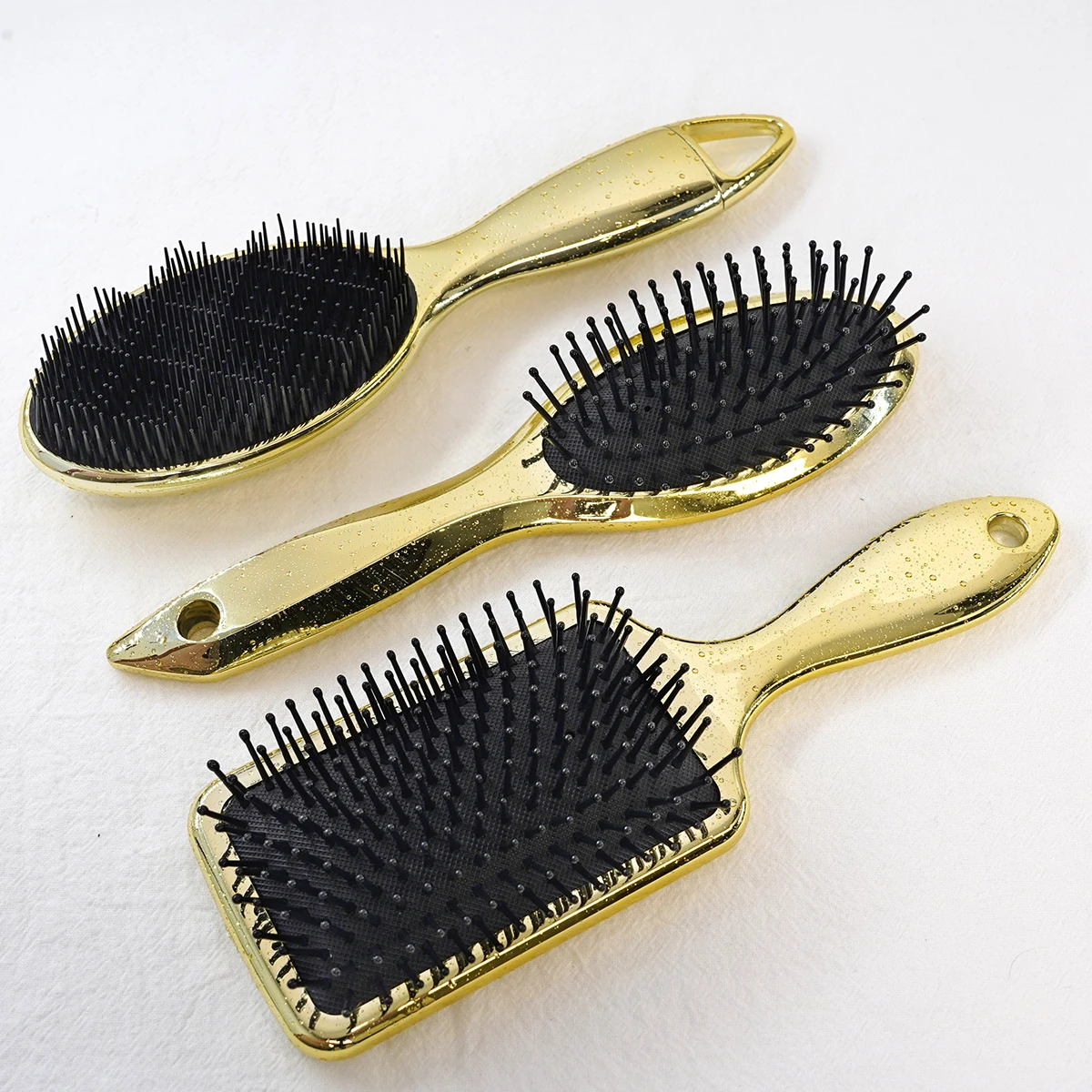 2022 New Arrival Water Drop Gold Electroplating Mermaid Paddle Cushion Hollow Detangler Hair Brush Styling Hair Brush Set