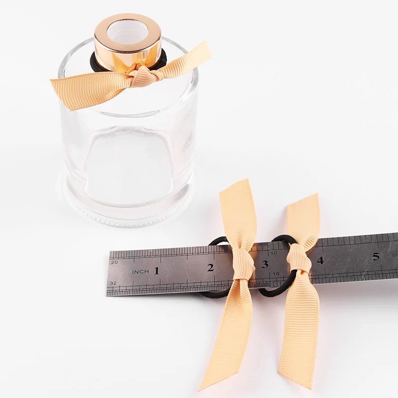 Wholesale gold PRE TIED ribbon bow with elastic ring to support customization