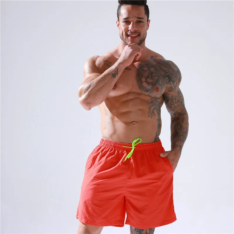 wholesale men pants summer sports shorts loose fit quick dry polyester board shorts male swim trunks beach shorts with pockets