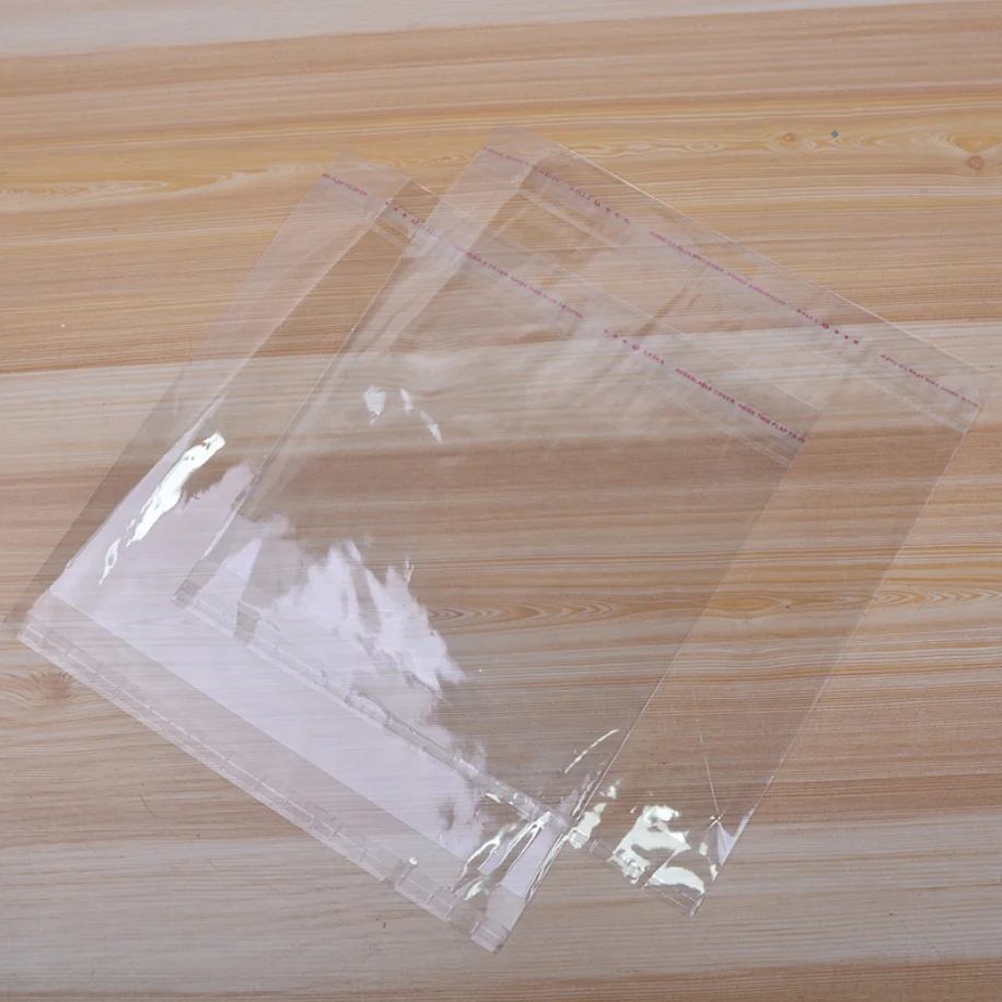 
Gift bag clothes clear opp poly bags with adhesive strip 