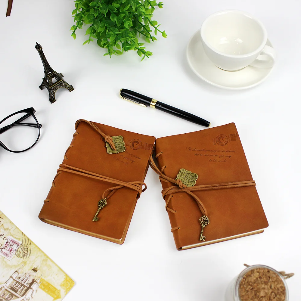 Custom Journal Faux Vintage Travel Dairy Notebook A7 PU Cover Blank Kraft Paper Leather Diaries With Pendant