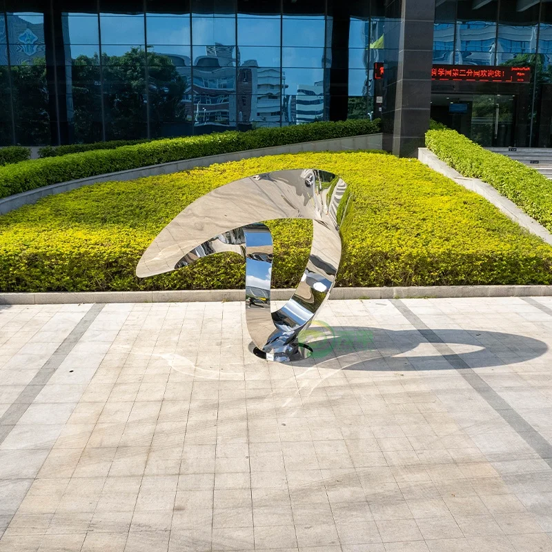 Large stainless steel sculpture in the park business square