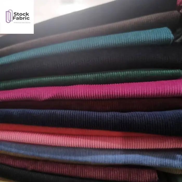 Hot selling ready goods nylon polyester corduroy dyed stock fabric for garment