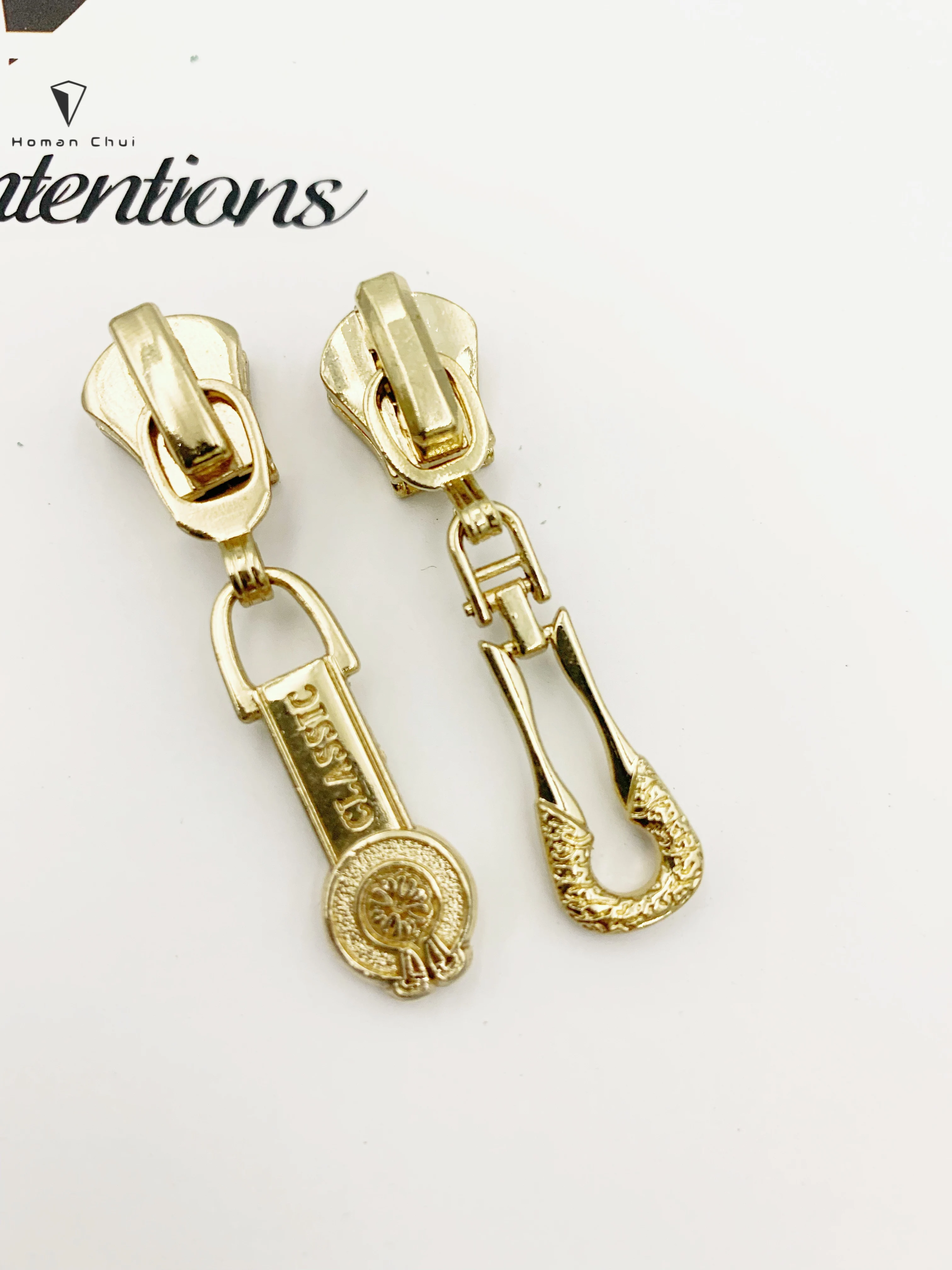 
customized brand logo embossed metal zipper puller with slider for bags/clothing 