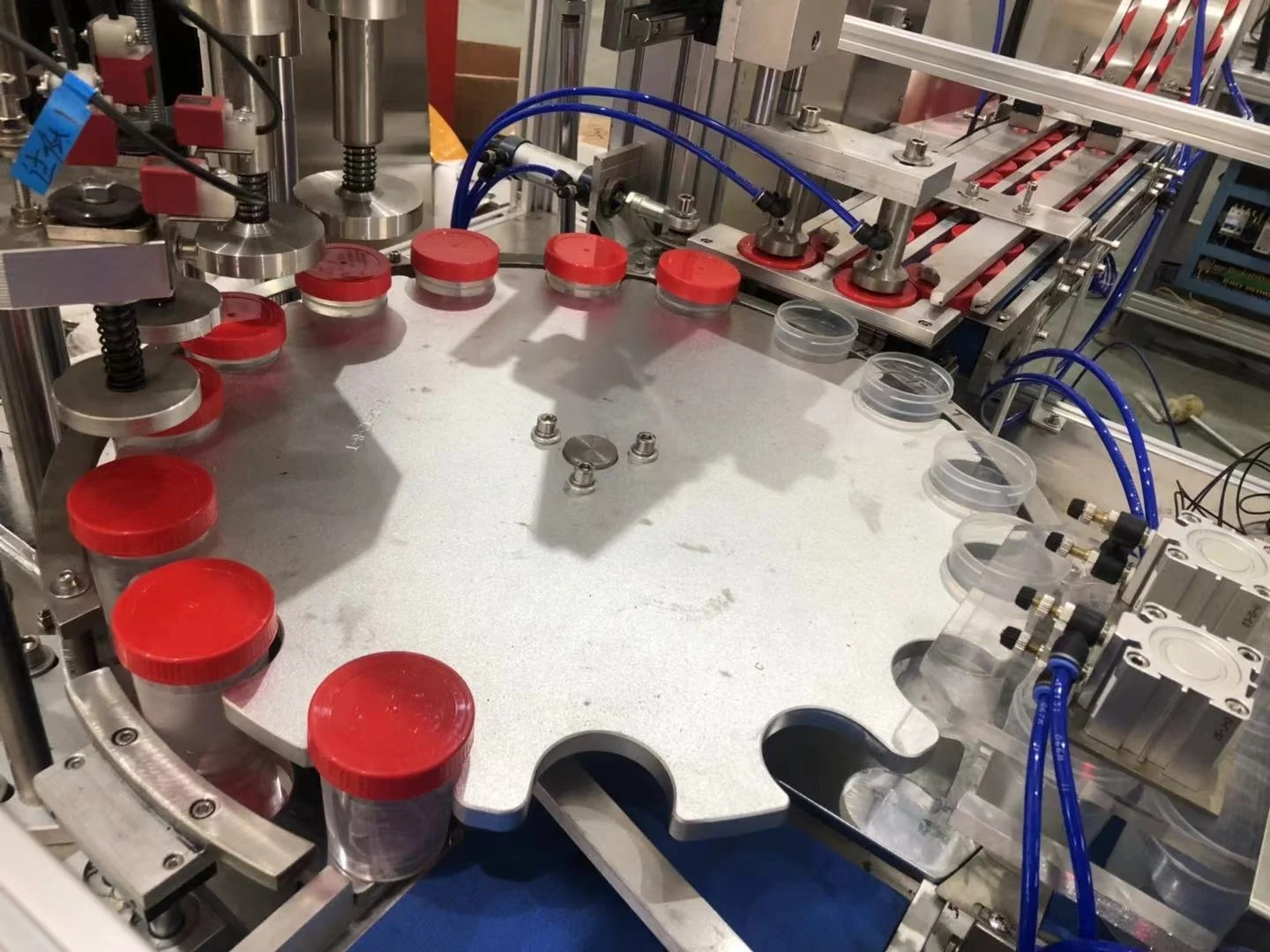 
3 parts urine Jar blood jar spoon cap capping Assembly Machine 