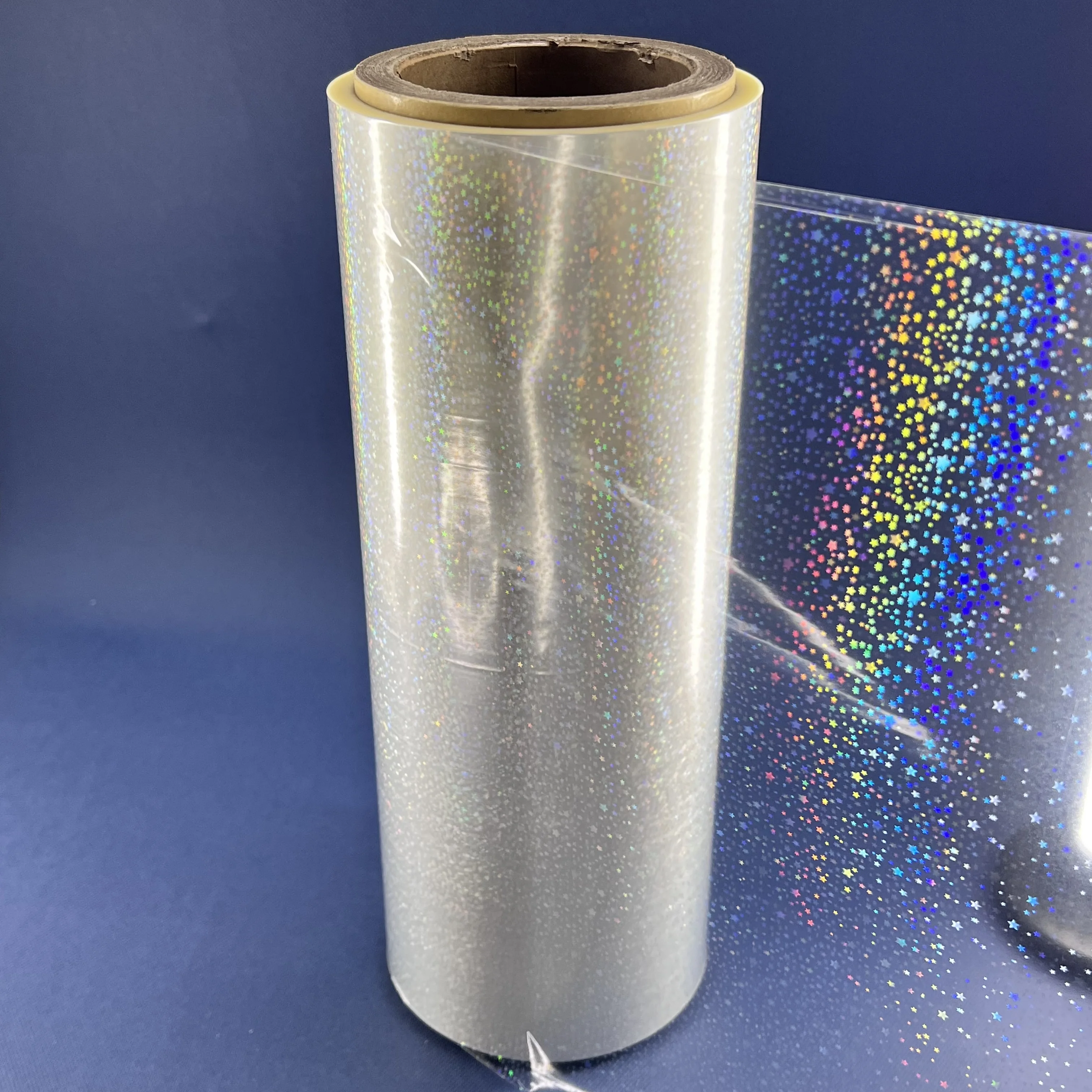 Low price 18 mico film holographic transparent hologram star wet laminating film without glue for printing card
