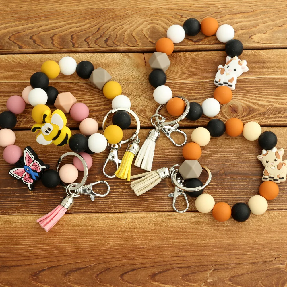 New Creative Cartoon Cow Elk Butterfly Wristlet Tassel Keychain For Girls Silicone Beads Bracelet Keychain Bag Pendant