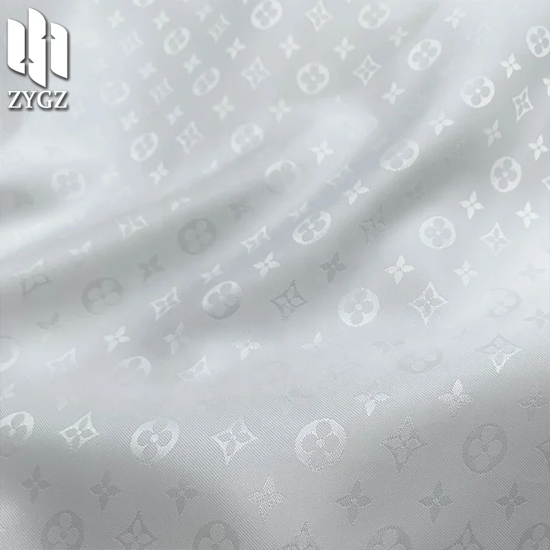 100 polyester 90GSM fashion brand jacquard yarn-dyed satin fabric clothing fabric lining wholesale