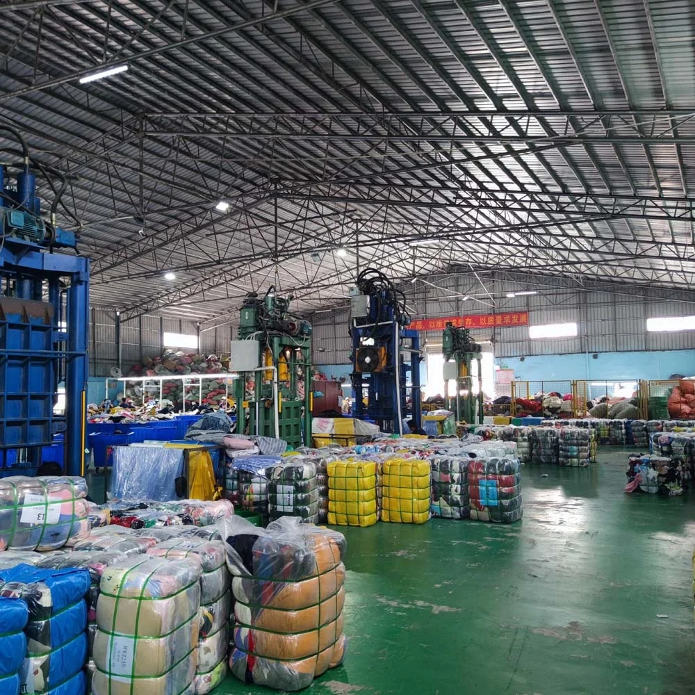 Import Vintage Thrift Store clothes used apparel bales second hand jeans denim trousers pants clothing
