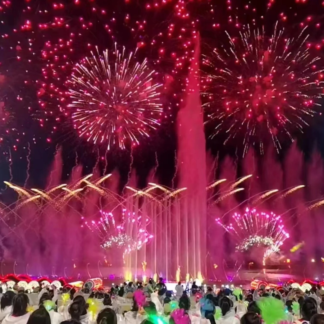 Water Show with fireworks, laser and 3D mapping projection. Dancing music fountain