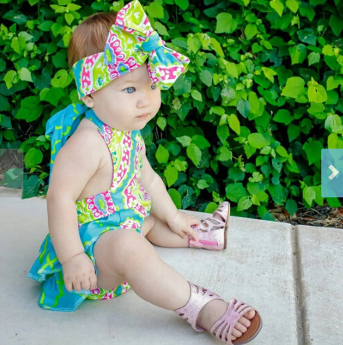 
Spring & summer new girl sling jumpsuit flower personality robe with head rope cute, crawl suit 