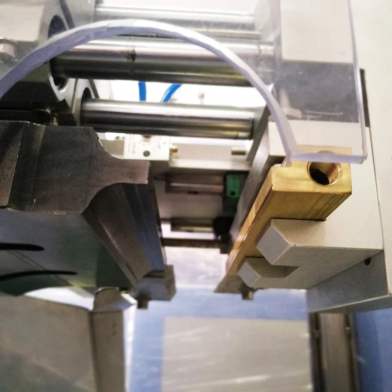 Horizontal type ultrasonic strip tube sealing welding machine