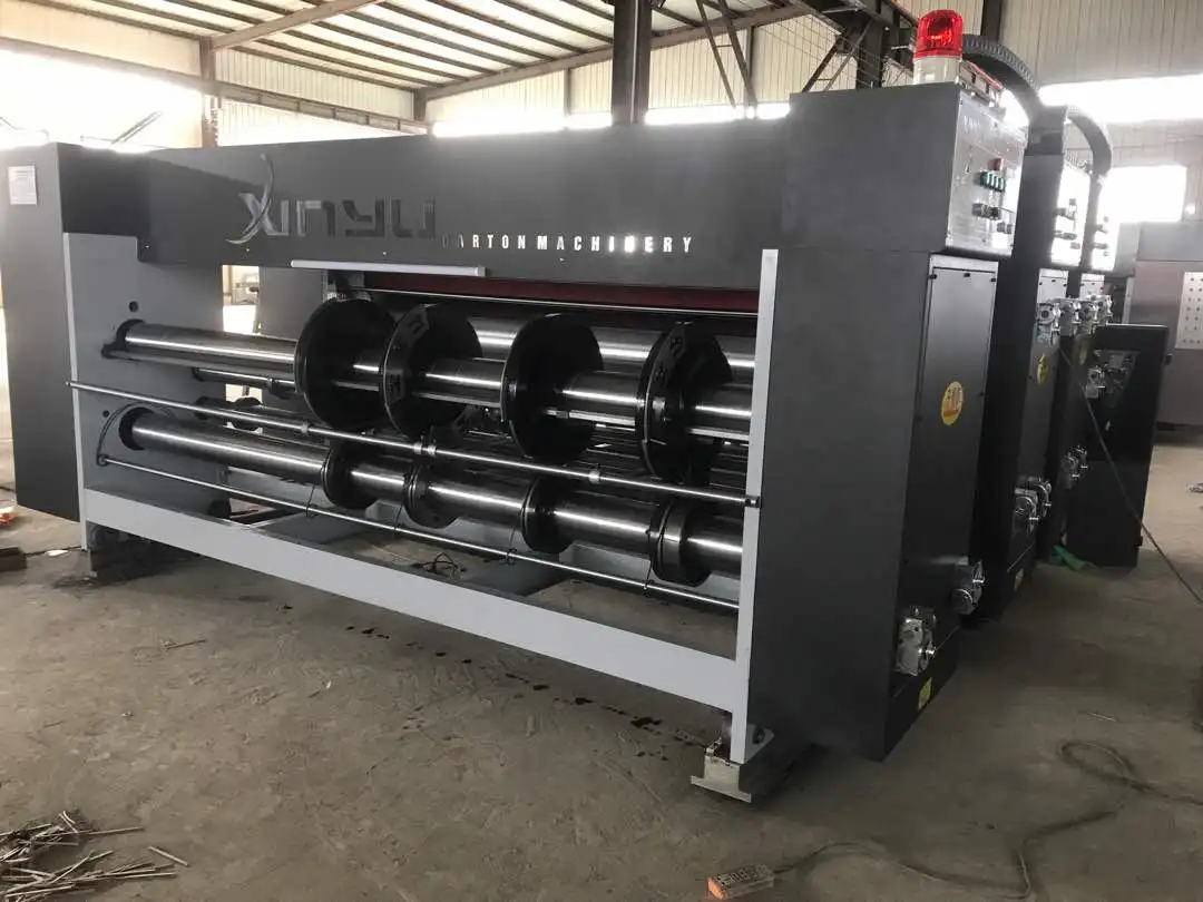 
Chain feeder four colors flexo printing slotting machine 