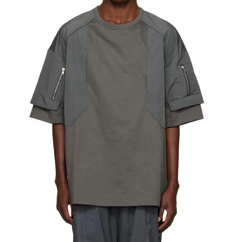 100% cotton Nylon taffeta and cotton jersey T-shirt Rib knit Welt sleeves Zip and patch 3 pockets Gray Paneled 3 pocket t-shirts