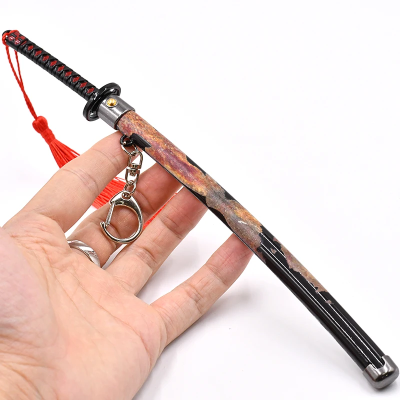Factory  manufacturers mini katana sword keychain of hot game Elden metal press eject sword key chain metal red sword decoration