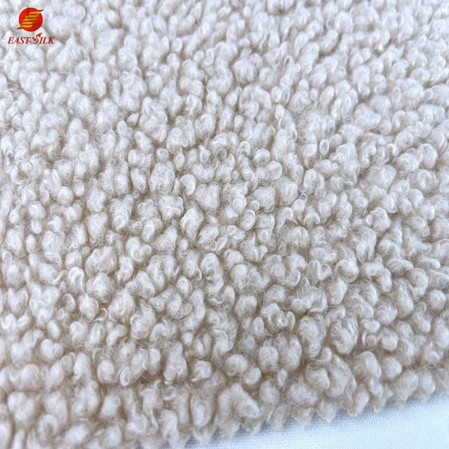 High quality 100% polyester polar fleeced fluffy fabric Knitted sleepwear poly super soft fleece bonded fabric for coat