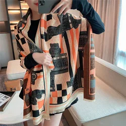 Bufanda de mujer de color de contraste 2021 invierno coreana bufanda gruesa de marca de estudiante de borla de Cachemira