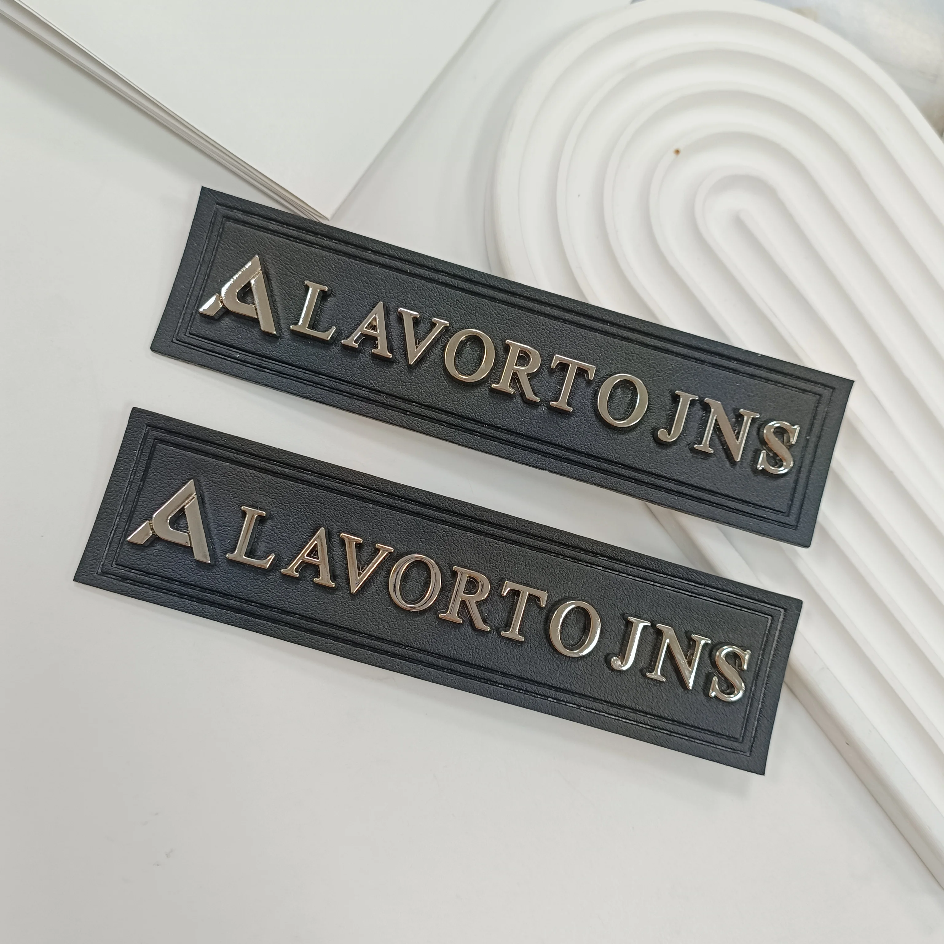 PU label design jacket clothing high-end metal label luggage leather patch silver letter leather logo label