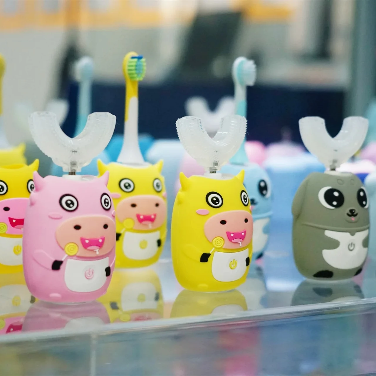 Kids electric toothbrush manufacturer children u shaped 360 automated toothbrush with 2 brush heads