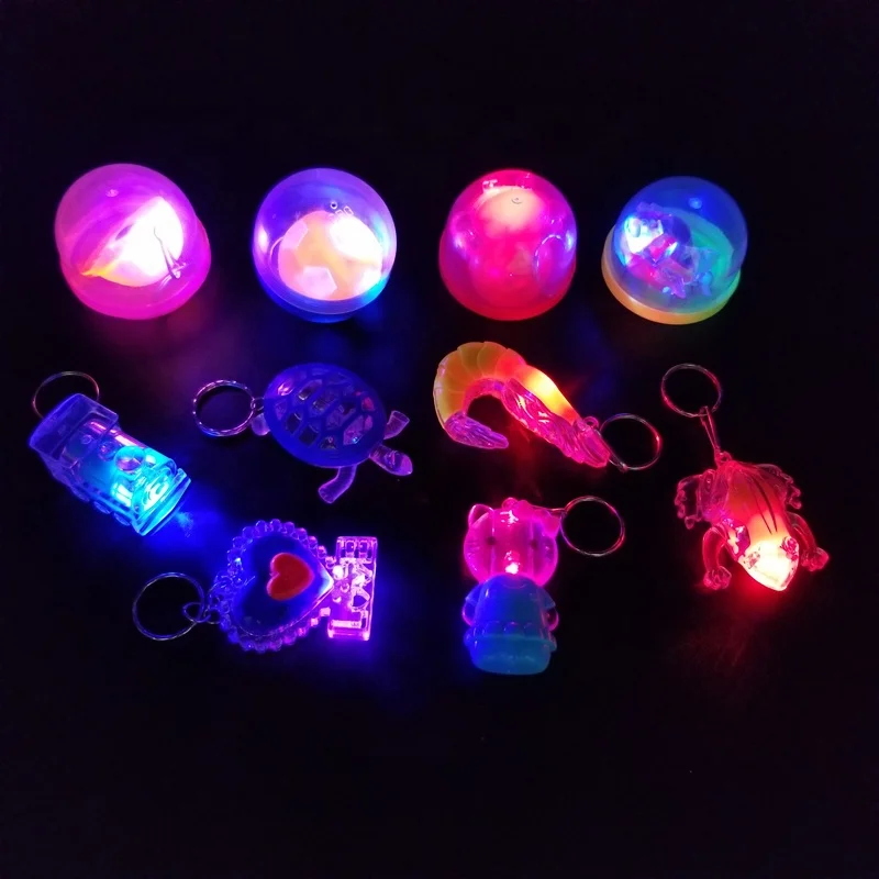 2022 Hot Sale Transparent Plastic Flashing LED Light up Keychain Toys for Capsule Vending Machine