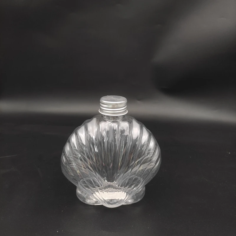 custom or standard factory unique shaped 350ml beverage juice milk bottles cute shell shaped plastic bubble tea cup