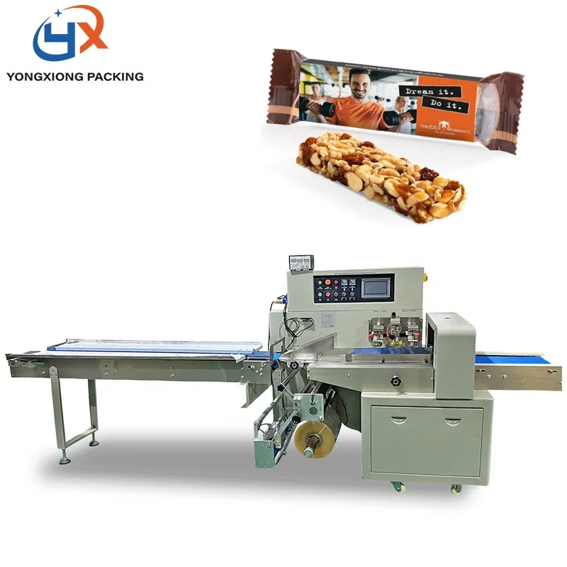 Yongxiong 2022 Automatic Chewy Oat Nut Granola Bars Packaging Machinery Candy Caramel Peanut Bar Packing Machine
