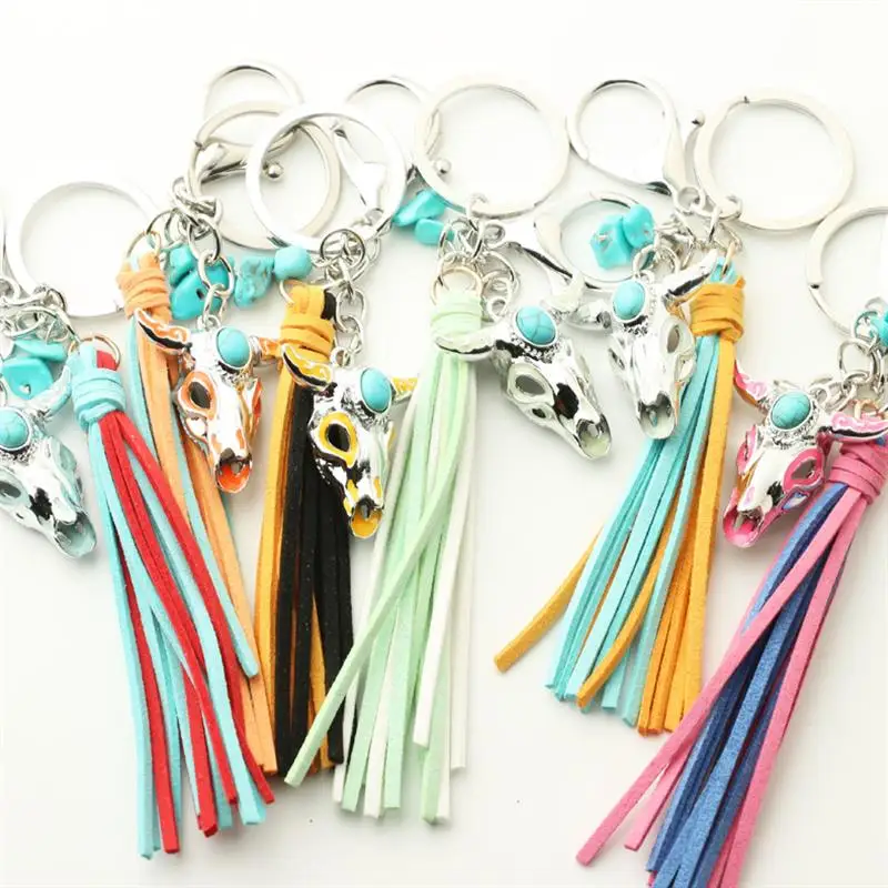 Dark shine vintage western style pine stone luminescent bull head fluorescent metal pendant skulls keychain