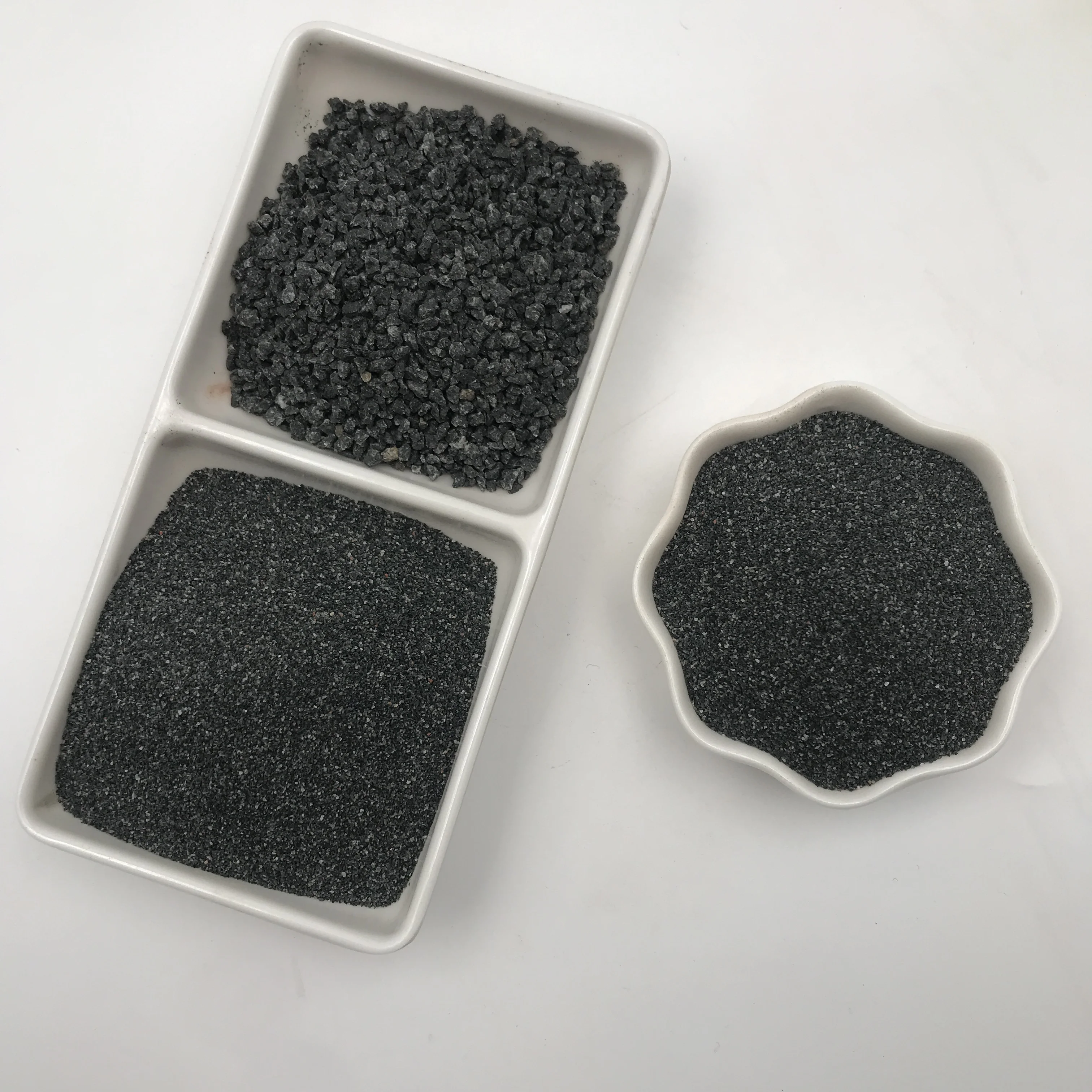 Glass fish tank with landscape sand, black and white, clean and free of impurities