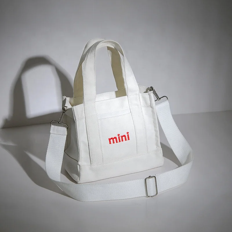 hot sale small natural soft cotton fabric black school bag supplier as graduation gift