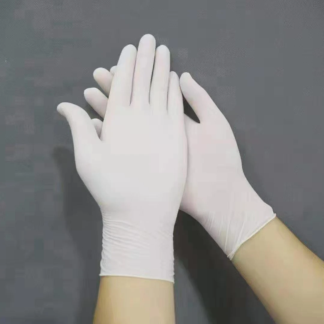 Disposable medical latex examination gloves