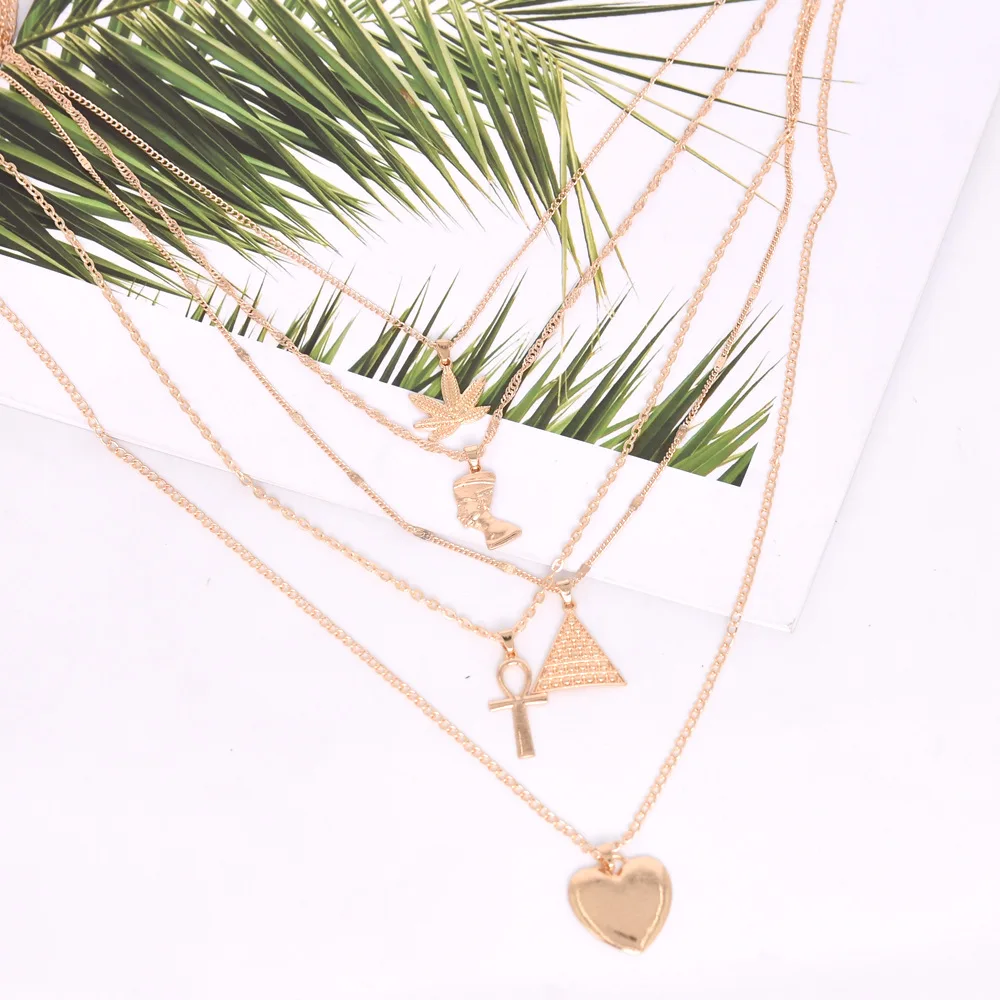 Exaggerated metal maple leaves Egyptian pharaoh yan pyramid heart pendant multi-layer necklace women