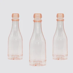 750ml transparent  PET plastic champagne  bottle with custom stickers for food packaging