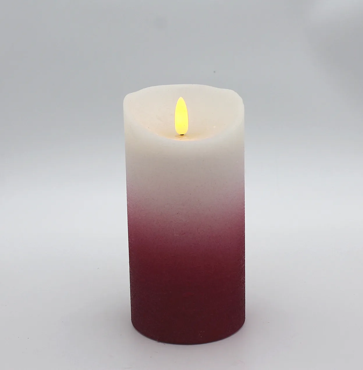 The new 2022 premium indoor LED flameless Christmas candle has a gradient of red