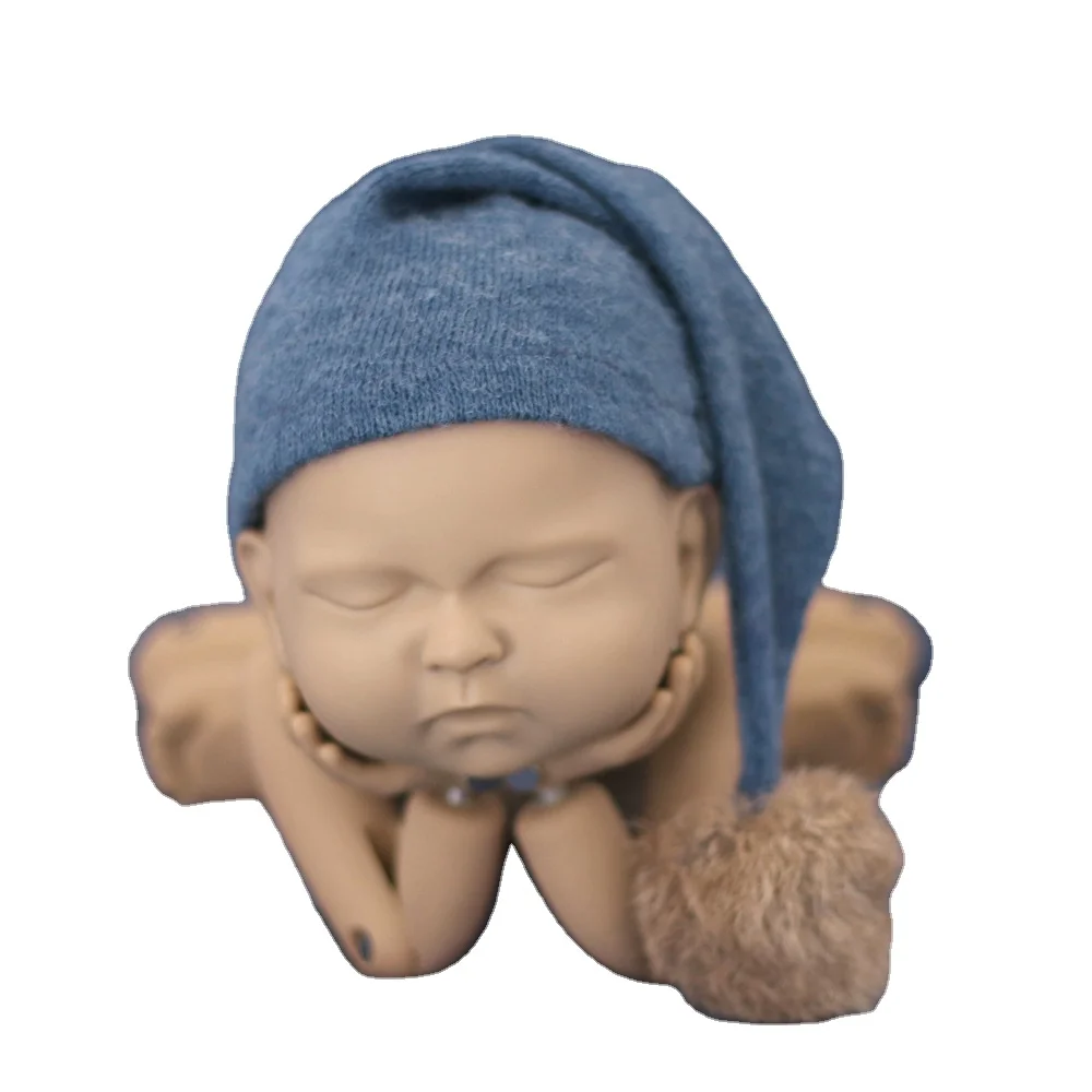 Newborn photography takes photos of cute modeling hats knitted long tail hats