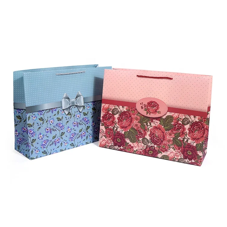 New Design  Hot sale hand-held The pattern of the flowers luxury wedding paper gift jewelry packaging bags bags