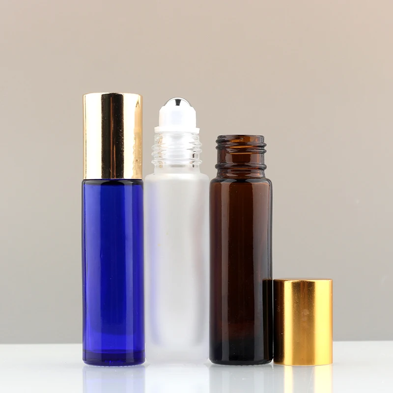 Stock 1/3 Oz Empty Transparent Amber Blue And Green 10 Ml Roll On Glass Bottles For Cosmetic Skin Care Packaging