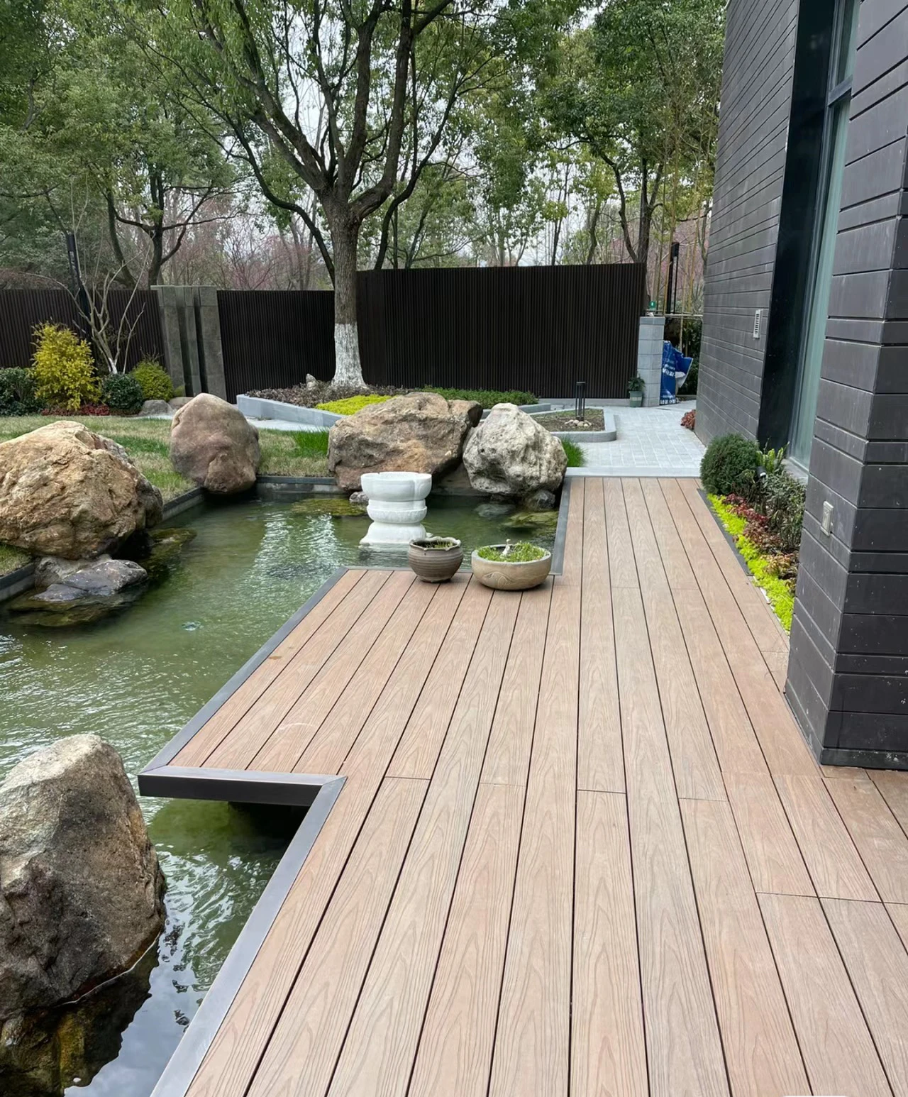 Outdoor wood-plastic composite 3D embossed flooring to decorate the garden floor