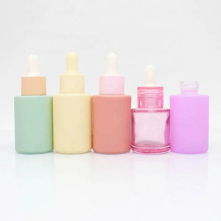 1oz 2oz 30ml 50ml Luxury Round Shape Pink Cosmetic Face Serum Essential Oil Glass Dropper Bottle With Packaging Box