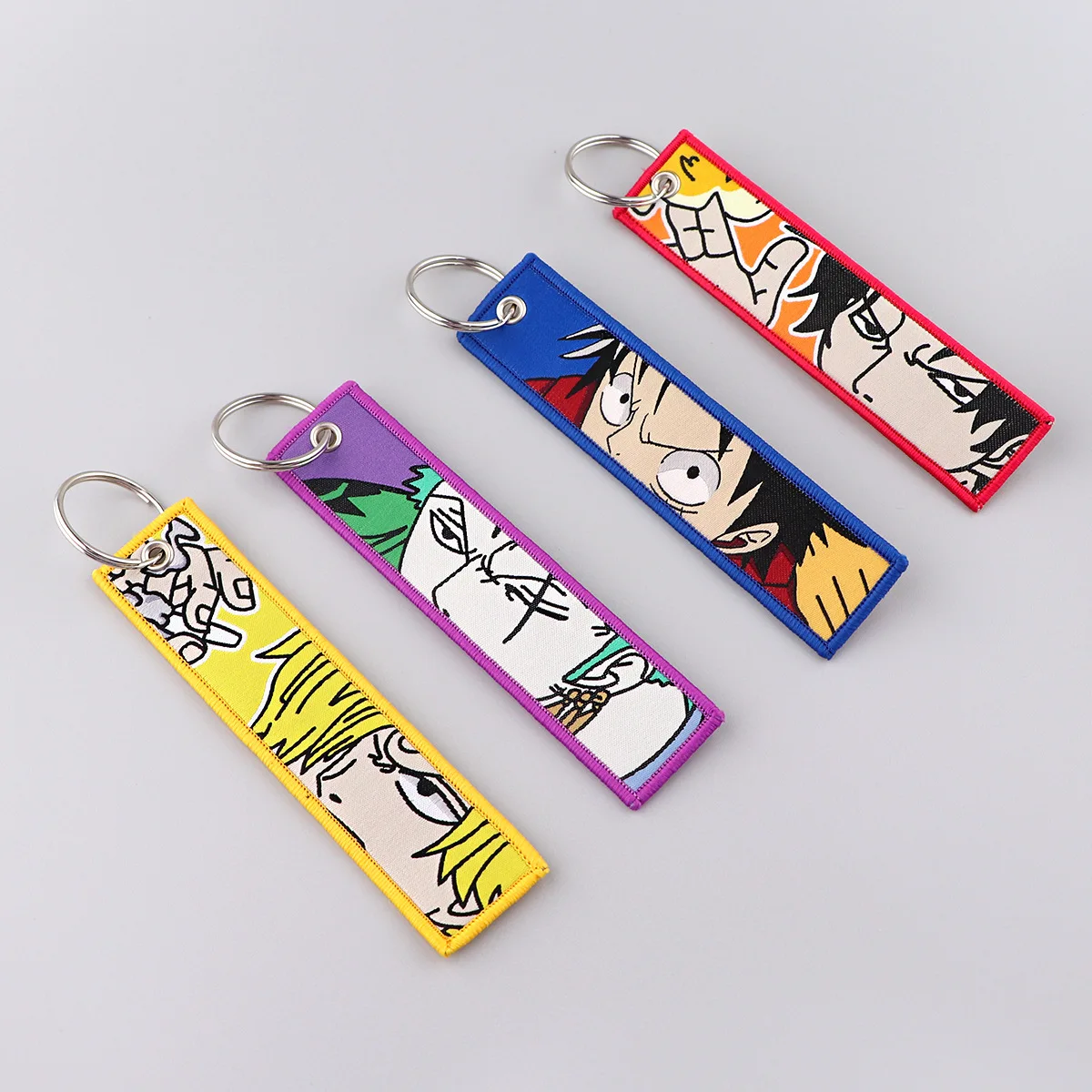 15 Design Wholesale Luffy Zoro  Fabric Embroidery Woven Keychains Cartoon Nami Chopper Anime Key Ring Tag Car Key Chain in Stock