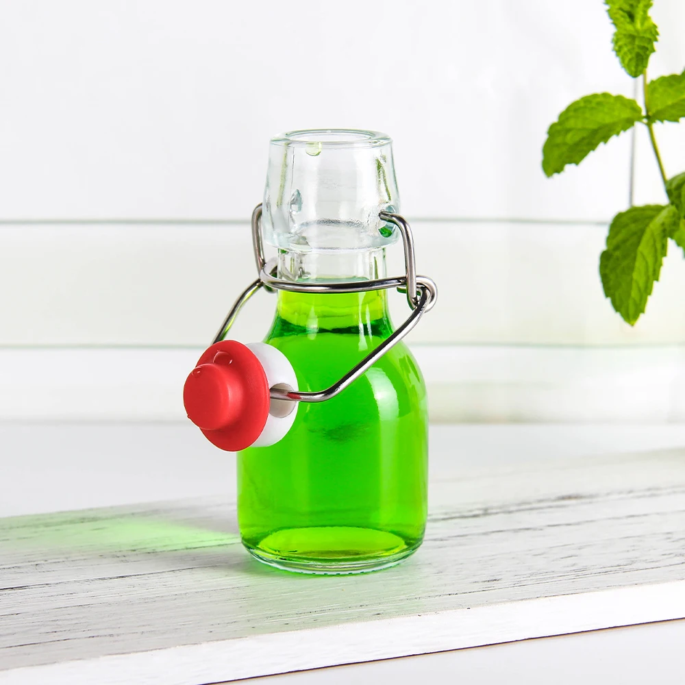 Wholesale popular UK 50ml Swing Top Drinking Water Empty Transparent Beverage Juice Coffee Milk Tea Glass Bottle In Stock