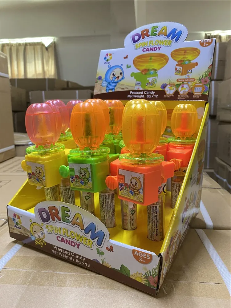 Shantou Plastic Toy Candy Wholesale Light Up Dream Spin Flower Candy Toys Sweets Caramelos