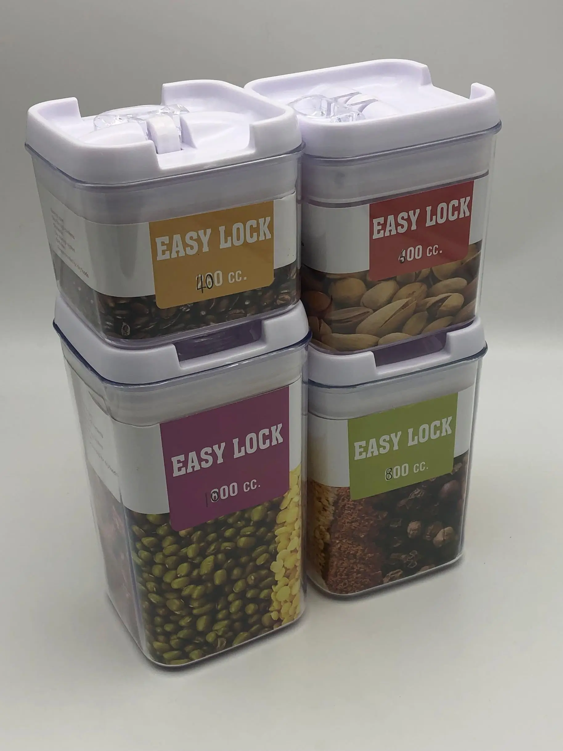 Set of 4 Plastic Canister Jars with Air Tight Lids for Kitchen or Bathroom Food Cookie Cracker Storage Containers