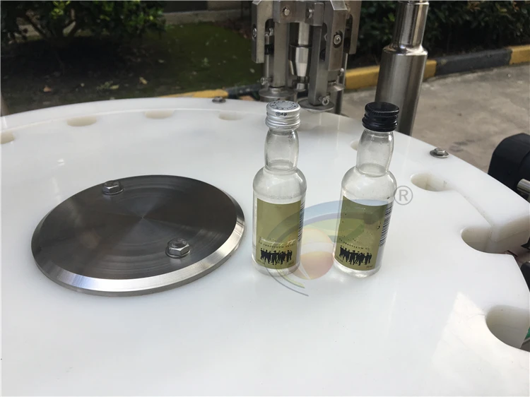 Gold supplier automatic alcohol drinks 60ml 100ml 500ml 750ml liquid filling machine