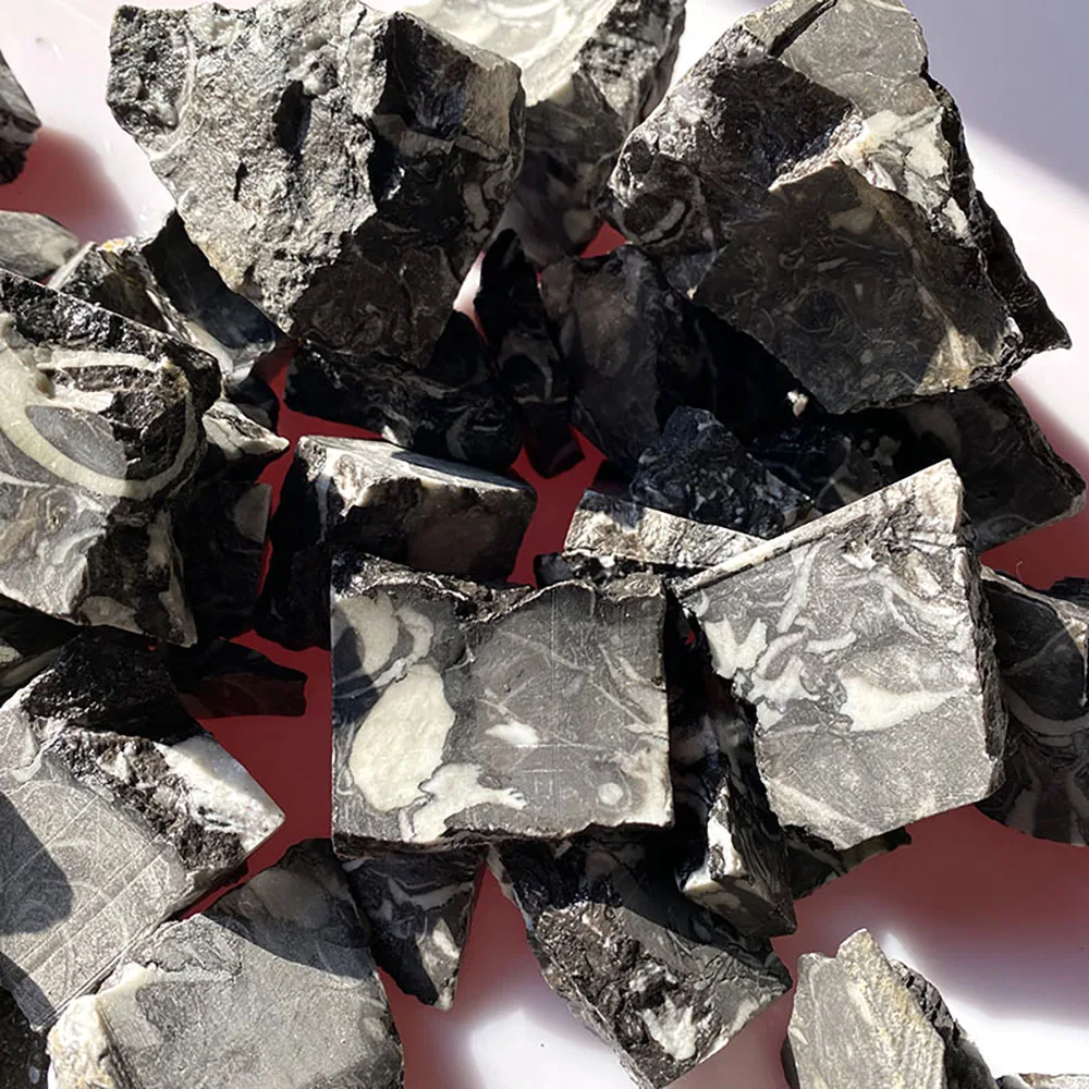 Natural aromatherapy stone wholesale black and white swallow jade raw stone