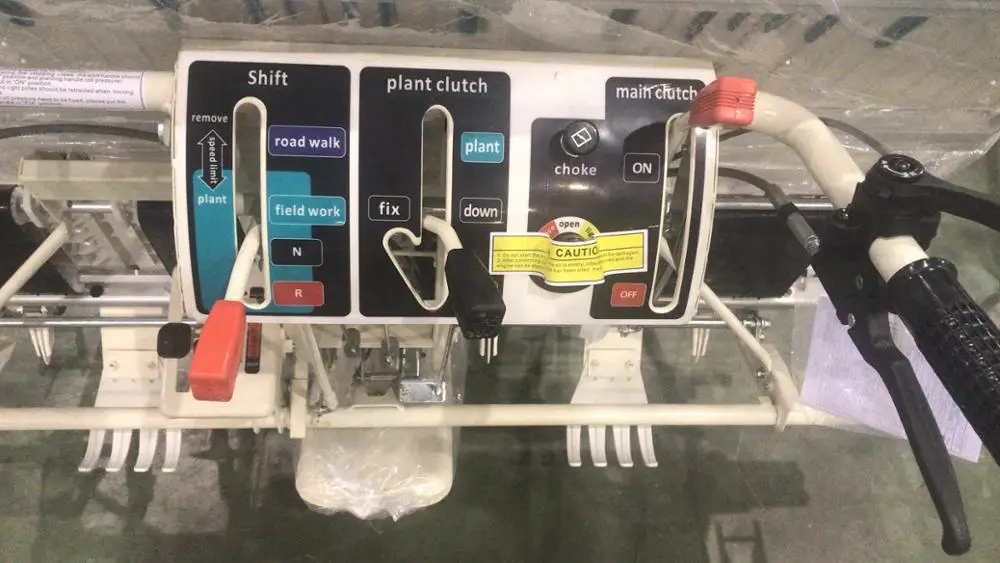 Rice seedling transplanting machine