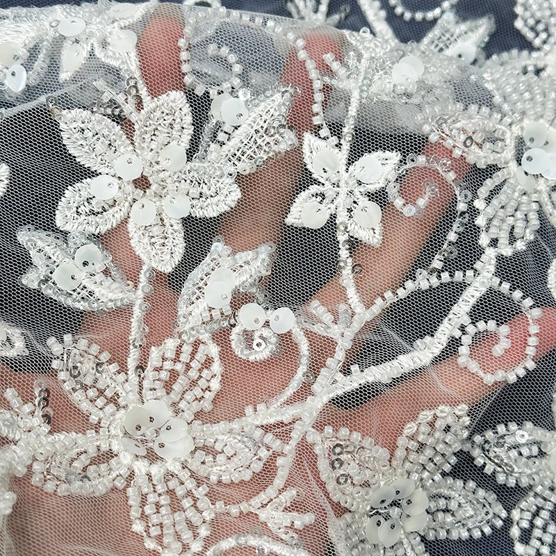 Manufacturer cheap high quality embroidery white lace fabric sequins french lace wedding bridal dress fabric for party