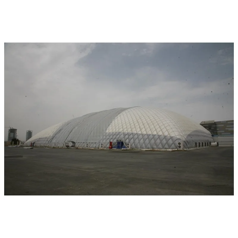 Customized inflatable membrane structure for a tennis hall gymnasium, featuring PVDF gas-seal technology and a large dome design