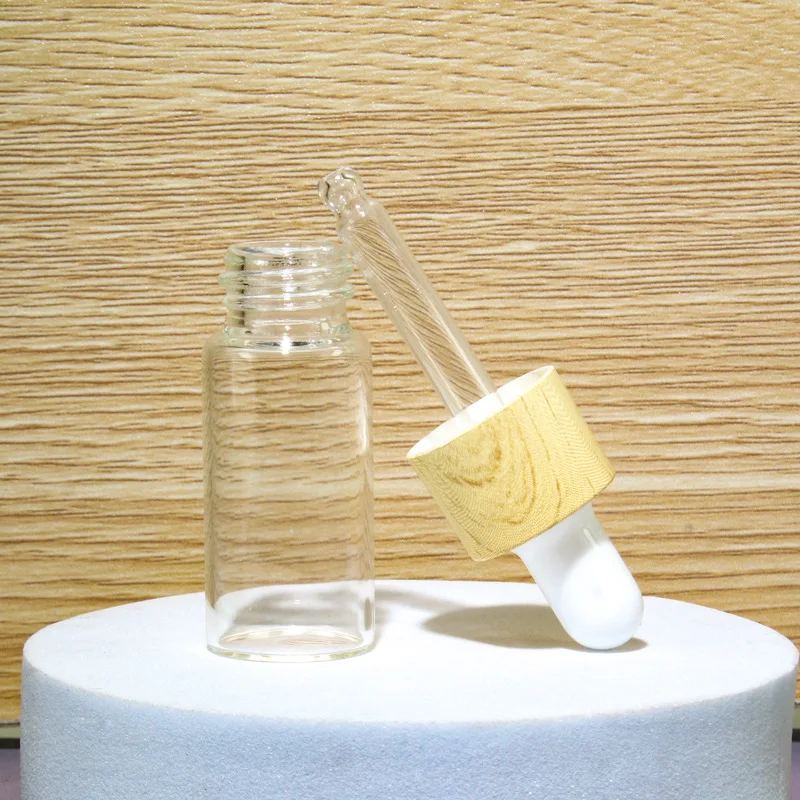Good quality 5 ml 10 ml 15 ml 20 ml Clear Essential Oil Refillable Glass Bottle With Bamboo Wood Grain Dropper