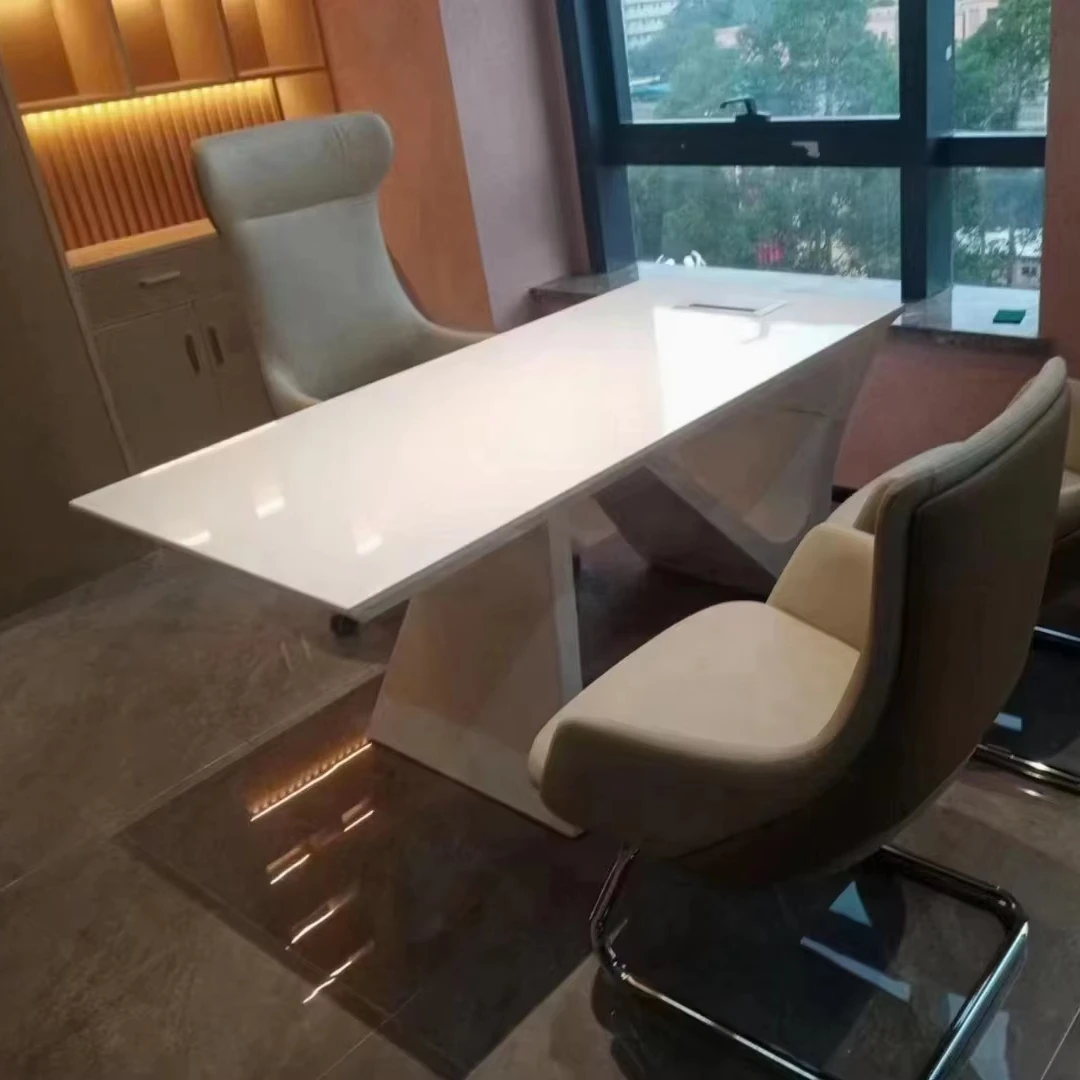 The contemporary wave-shaped leg design is used for a stable and customizable size multi-functional cable box executive desk.